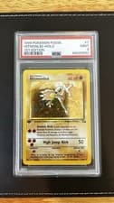 Pokemon 1999 Hitmonlee 7/62 Holo 1st Edition Fossil PSA 9
