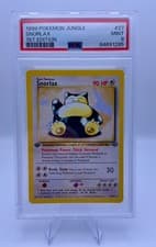 😴 SNORLAX 1ST EDITION 27/64 – JUNGLE (1999) – PSA 9 MINT